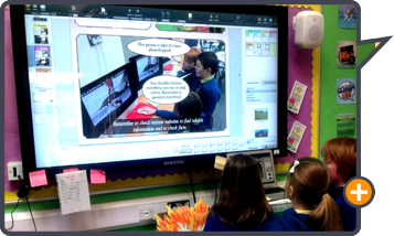 Students use Comic Life 3 collaboratively on large screen.